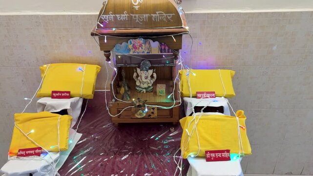 sarva dharma prathana mandir with sacred texts and holy hindu god idols