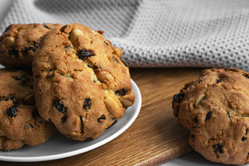 Fresh baked goods for breakfast. Photo cookies with nuts and raisins. For bakery recipe, food post, article.