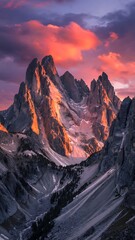 Stunning sunset paints the rugged peaks of the Dolomites in fiery hues, creating a breathtaking vista perfect for travel brochures and adventure campaigns