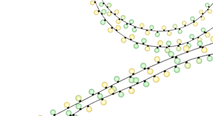 Strings of decorative lights with green and yellow bulbs hanging against a black background scene view