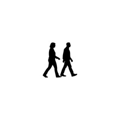 Silhouetted couple walking together side by side representing connection and partnership in black and white