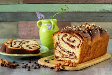 Sweet marbled brioche plait with nuts and chocolate	