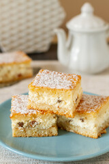 Slices of homemade cottage cheese cake with raisins