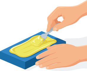 Hands applying a yellow creamy substance onto a rectangular blue surface using a small metal spatula