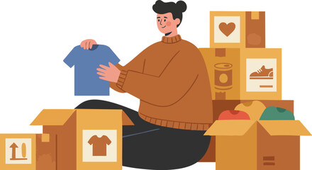 Person sorting donated clothes and items into boxes for charity or community assistance programs