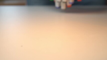 set of colorful graphic art markers arranged on a light surface abstract composition - Powered by Adobe