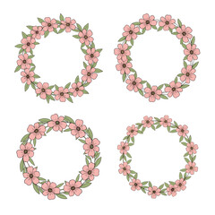Four delicate floral wreaths with soft pink blossoms and green leaves arranged in a circular pattern.