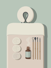 Spa Treatment Table with Essential Oils and Rolled Towels