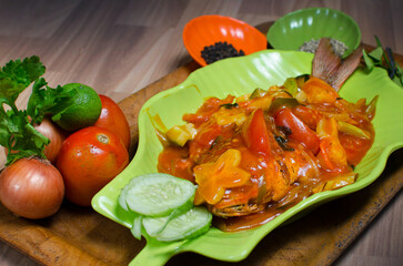 Crispy Whole Fish with Sweet and Sour Sauce on Green Plate – Asian Cuisine, Traditional Seafood Dish, Authentic Home-Cooked Style Food Photography