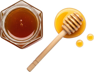 A hexagonal jar brimming with rich amber honey sits beside a wooden honey dipper on a puddle of golden liquid with two small drips nearby Isolate sweet