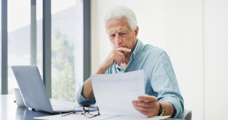 Fototapeta premium Home, thinking and old man with documents, financial analysis and doubt with retirement fund. Pensioner, confused or mature person with paperwork, pc or asset management with insurance policy or debt