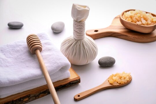 Spa relaxation set with herbal compress and honey - Powered by Adobe
