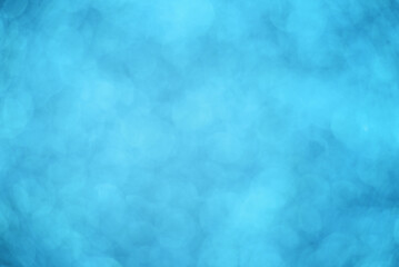 Blue abstract bokeh background with soft light