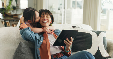 Hug, learning or tablet with mother and daughter on sofa in living room of home for development....