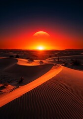Desert Sunset - A Breathtaking View of the Sun Over Sand Dunes.