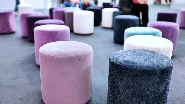 Colorful velvet stools arranging for exhibition seating contemporary design