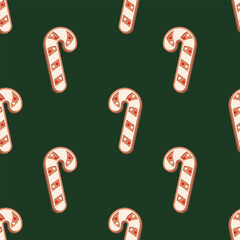Seamless pattern with gingerbread cookie in form of candy cane decorated of sugar icing on a dark green background. Vector festive background.