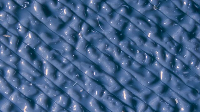 3D printed surface first layer with 0,4mm nozzle on textured hotbed under microscope