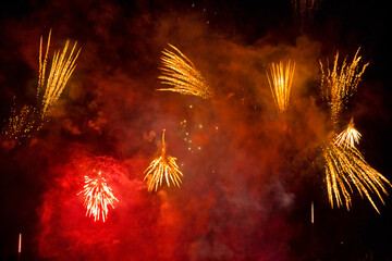 Close-up of fireworks with red and yellow lights