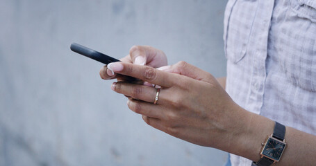 Typing, hands and woman outdoor with phone, post comment and chat update on social media. Message,...