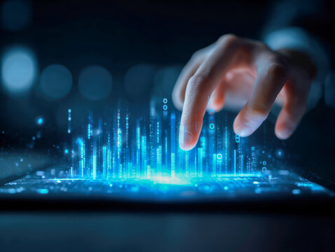 Human hand interacting with futuristic digital holographic data projections emerging from a tablet screen in a dark technology environment concept - Powered by Adobe
