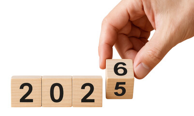 Hand changing wooden block from 2025 to 2026 on white background year new year isolated on a transparent background