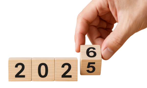 Hand changing wooden block from 2025 to 2026 on white background year new year isolated on a transparent background