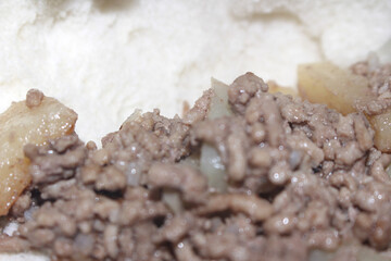 Details of the ground meat, prepared for a meal. Ground meat details prepared for a meal. Close-up of minced beef. minced beef with selective focus.