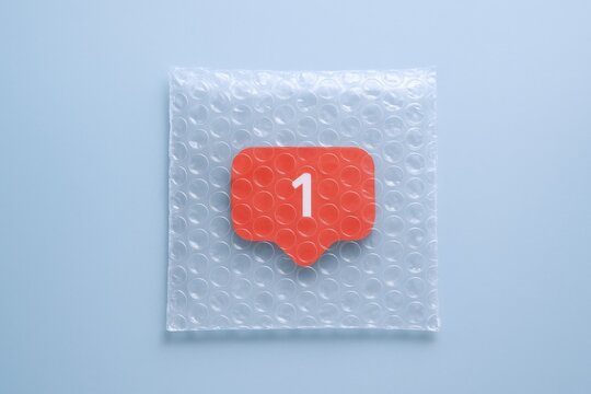 New Notification Icon on Bubble Wrap Background: Minimalist Social Media Concept