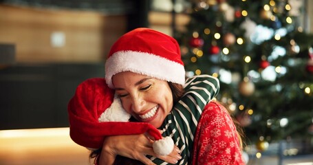 Christmas, mom and child hug in home for love, care and support with parent on holiday with bokeh. Xmas, happy mother and embrace girl for family connection, gratitude and thank you with daughter