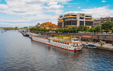 Fototapeta premium Large passenger river cruise ship on Vltava.