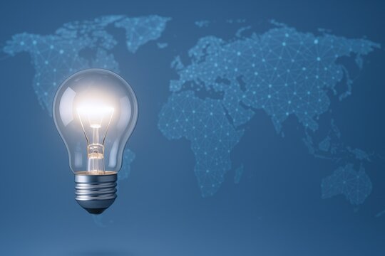 Global Innovation Concept: Lit Lightbulb Symbolizing Worldwide Ideas and Solutions on a World Map Background