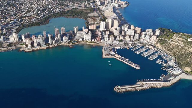 Aerial View of Calp, Spain and the Extensive Condos, Villas, and Prime Real Estate by the Majestic Pe&ntilde;&oacute;n de Ifach on the Mediterranean Coast