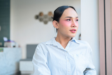 Portrait of a young Thai transgender business person at coffee shop