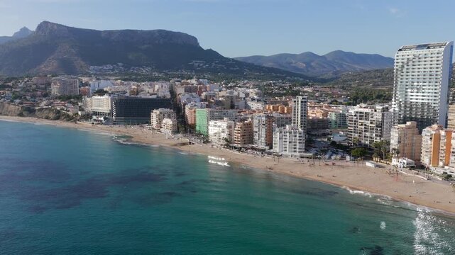Aerial View of Calp, Spain and the Extensive Condos, Villas, and Prime Real Estate by the Majestic Pe&ntilde;&oacute;n de Ifach on the Mediterranean Coast