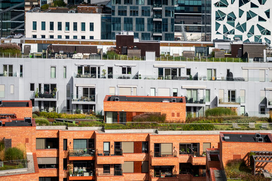 Buildings and housing illustrating modern architecture within urban development in Bjorvika Oslo Norway, showing structured contrast from an elevated and orderly viewpoint