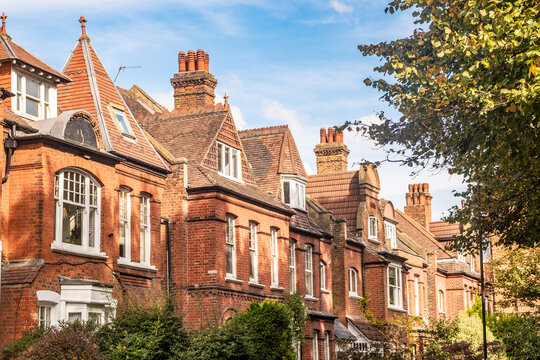 LONDON-  Row of old typical red brick terraced houses in Chiswick, West London