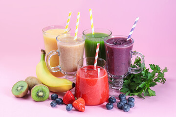 Different tasty smoothies in glasses and ingredients on pink background