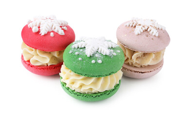 Festively decorated macarons isolated on white. Christmas treat