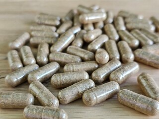 Healthy nutrition. Herbal capsules and antiparasitic supplements. Bitter herbs and anti-stress concept