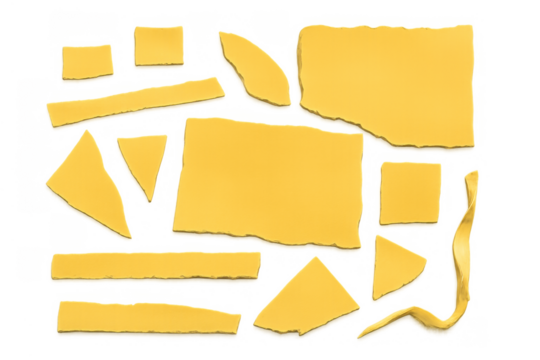 Yellow torn paper pieces creating abstract collage elements with ripped edges on transparent background