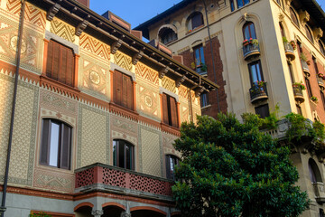 Naklejka premium Historic residential buildings along via Eupili in Milan, Italy