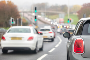 Traffic jam congestion with rows of cars on highway or motorway in rush hour