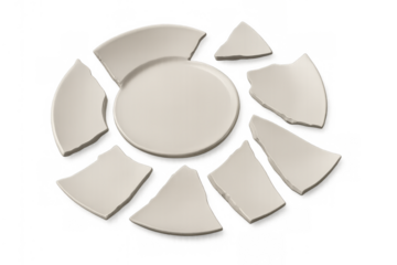 White ceramic plate shattering into many fragments, symbolizing breakage, end of relationship, crisis