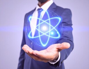 Businessman Holding a Glowing Blue Atomic Model in Hand