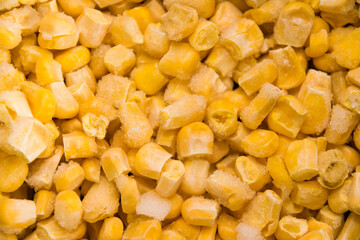 Frozen corn kernels close-up. Food preparation and storage concept
