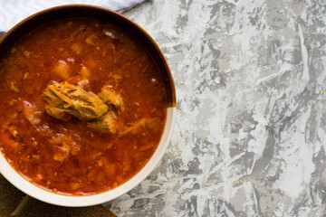 Delicious and aromatic red soup with meat, Ukrainian borscht. Traditional Ukrainian dish, cuisine