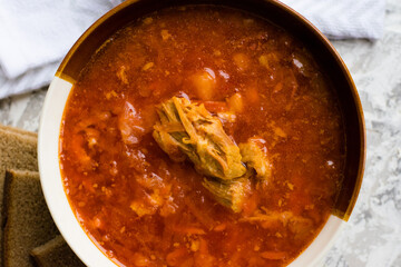 Delicious and aromatic red soup with meat, Ukrainian borscht. Traditional Ukrainian dish, cuisine