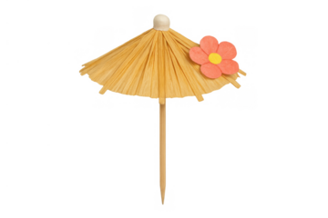 Cocktail umbrella with a pink flower on top, bringing tropical vacation vibes and summer celebration mood