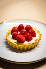 Close-up view of raspberry tart.